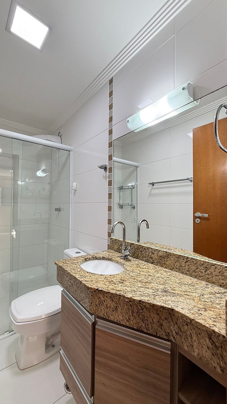 Apartamento de temporada Pé na areia Praia Grande - Caribas2