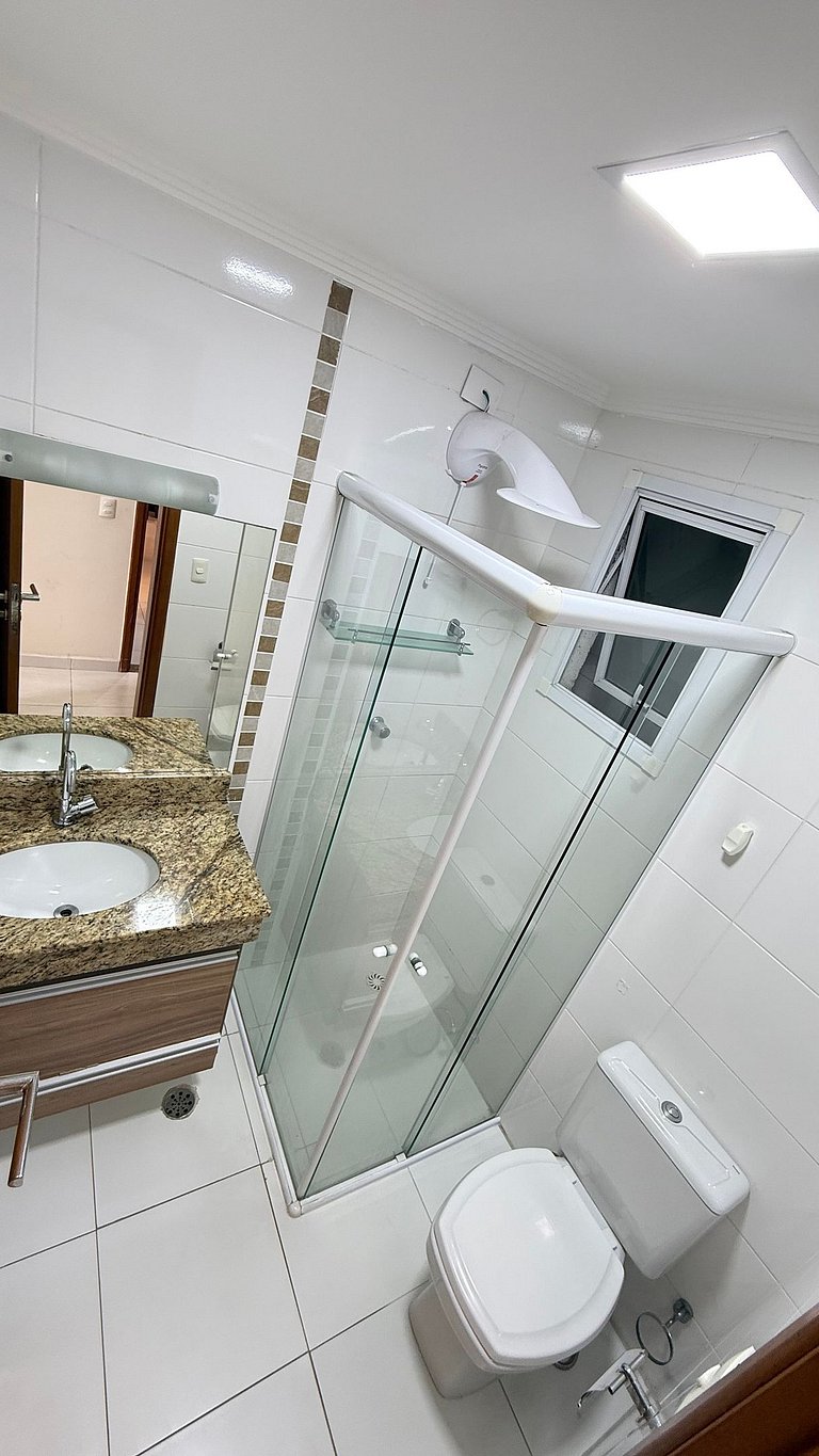 Apartamento de temporada Pé na areia Praia Grande - Caribas2
