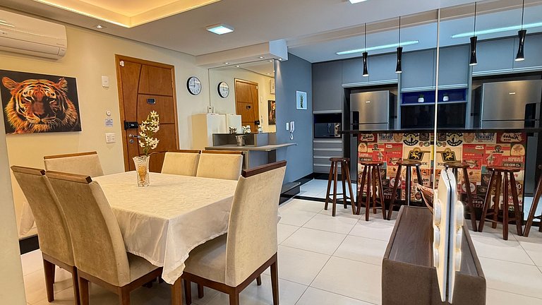 Apartamento de temporada Pé na areia Praia Grande - Caribas2