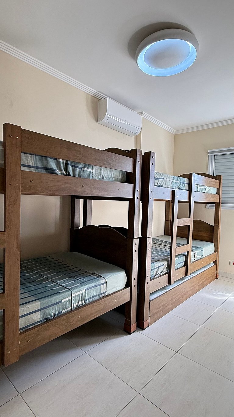 Apartamento de temporada Pé na areia Praia Grande - Caribas2