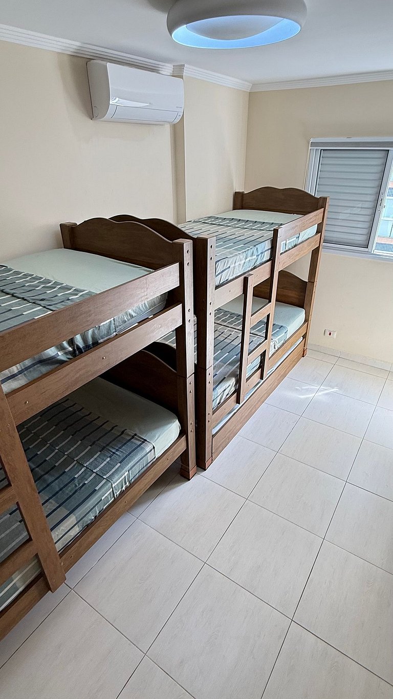 Apartamento de temporada Pé na areia Praia Grande - Caribas2
