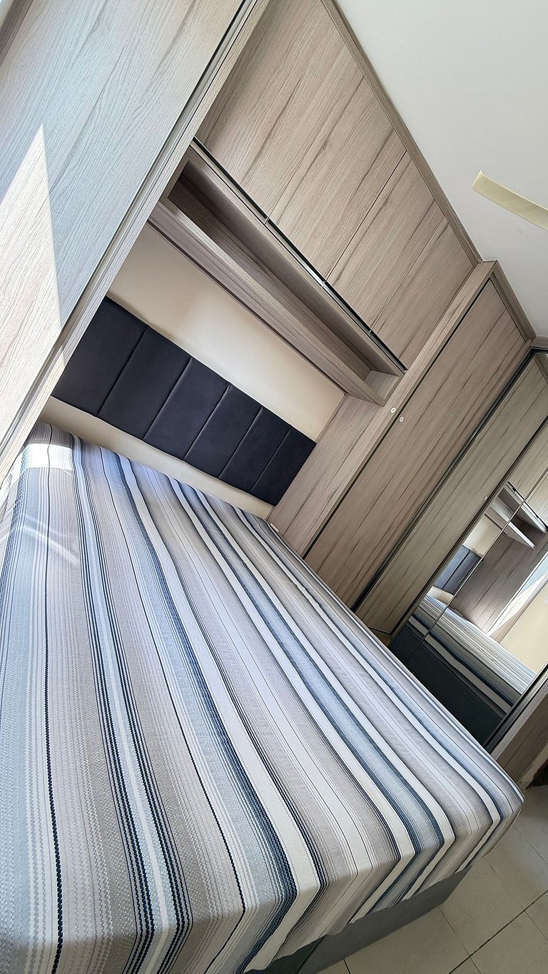 Apartamento de temporada Pé na areia Praia Grande - Caribas2