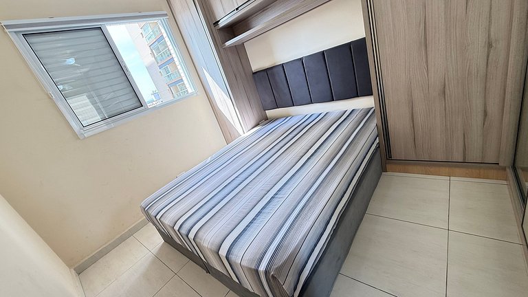 Apartamento de temporada Pé na areia Praia Grande - Caribas2