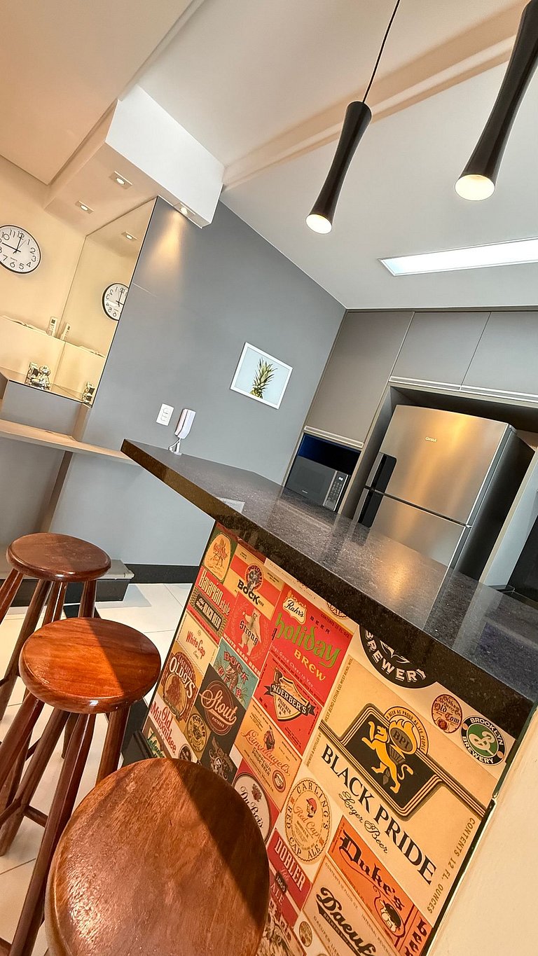 Apartamento de temporada Pé na areia Praia Grande - Caribas2