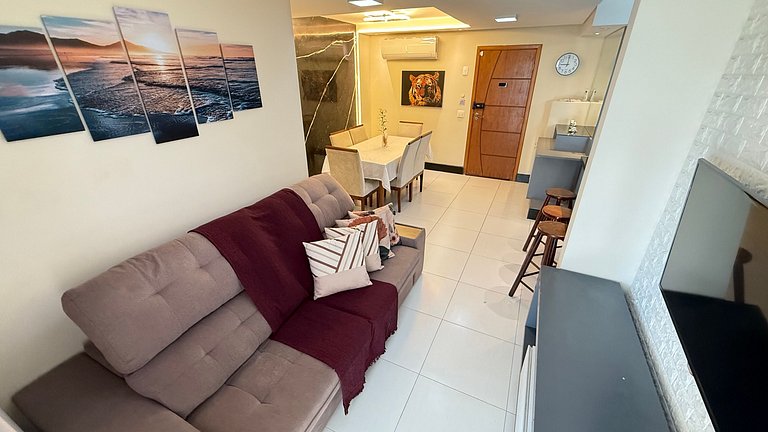 Apartamento de temporada Pé na areia Praia Grande - Caribas2