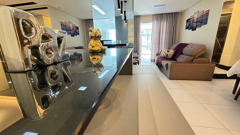 Apartamento de temporada Pé na areia Praia Grande - Caribas2