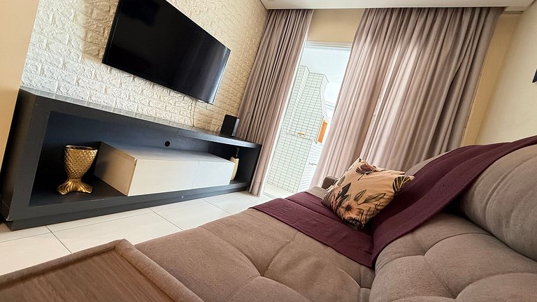 Apartamento de temporada Pé na areia Praia Grande - Caribas2