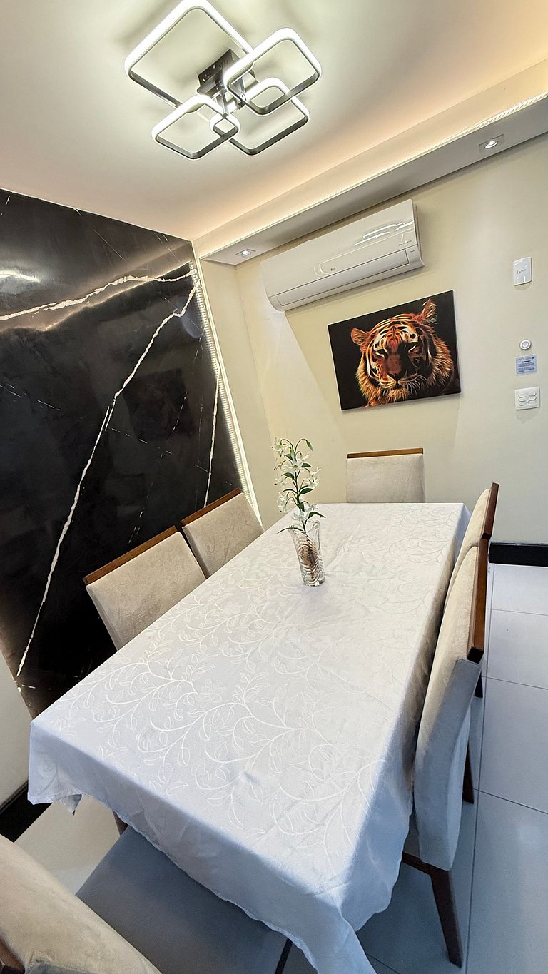 Apartamento de temporada Pé na areia Praia Grande - Caribas2